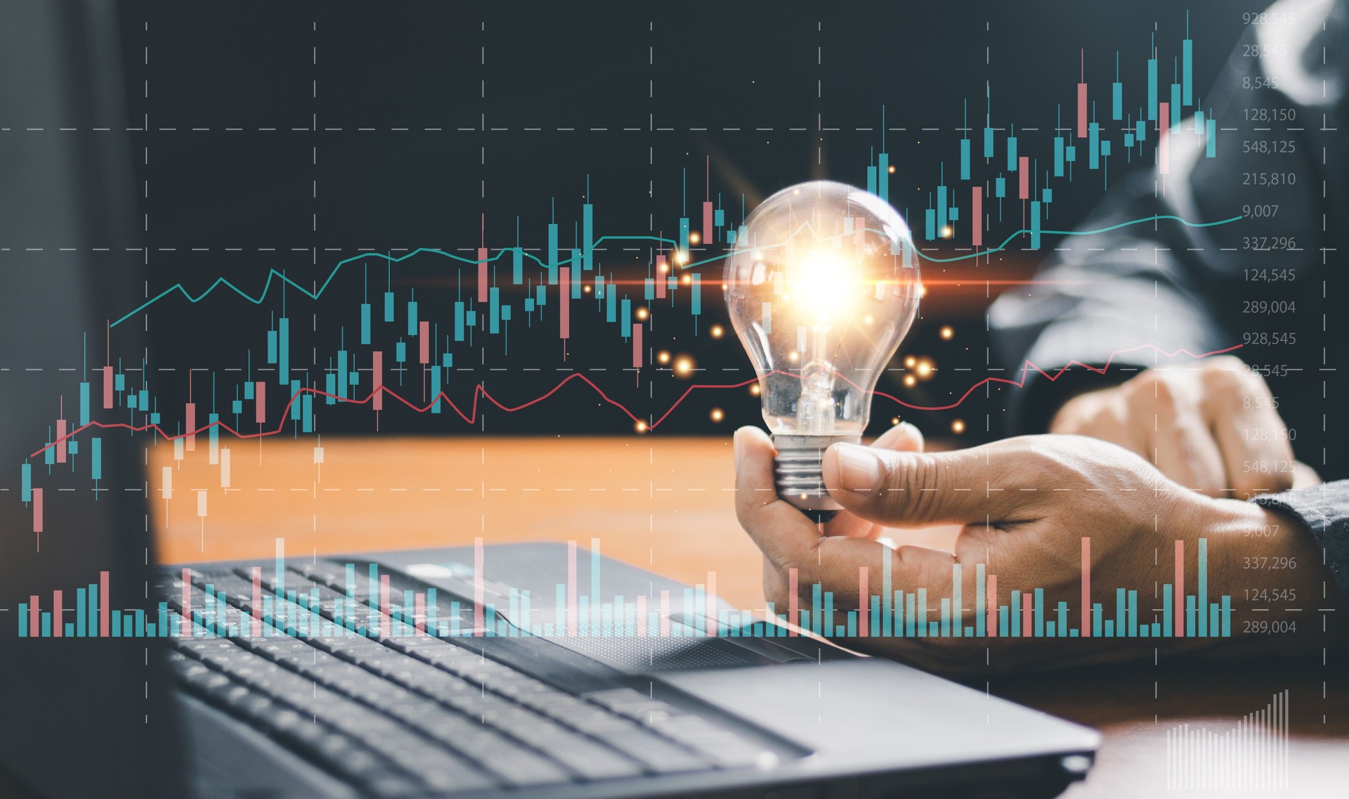 Businessman holding creative light bulb with growth graph and banking icons. Financial innovation technology develop new products and services that enhance successful and profit in global business.